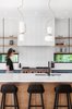 Modern home with Kitchen, Engineered Quartz Counter, Ceramic Tile Backsplashe, Wood Cabinet, Pendant Lighting, Colorful Cabinet, and Undermount Sink. Kitchen Photo 15 of Vancouver Island Residence