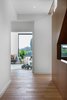 Modern home with Hallway and Medium Hardwood Floor. Stair towards Family Room Photo 20 of Vancouver Island Residence