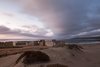Modern home with Exterior, Flat RoofLine, Concrete Siding Material, Beach House Building Type, and House Building Type. The house is designed to protect itself from the south wind and to embrace the view and solar orientation of the north. Photo 5 of Pi House