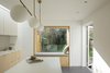 Modern home with Dining Room, Bar, Recessed Lighting, Pendant Lighting, Ceiling Lighting, Storage, and Concrete Floor. The Nook Photo of The Nook House