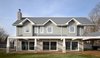 Modern home with Exterior, House Building Type, Stone Siding Material, Shingles Roof Material, Vinyl Siding Material, and A-Frame RoofLine. Exterior Photo 7 of The Southold House