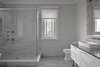 Modern home with Bath Room, Granite Counter, Light Hardwood Floor, Vessel Sink, Ceiling Lighting, Corner Shower, Enclosed Shower, Freestanding Tub, and One Piece Toilet. Master Bathroom Photo 5 of The Southold House