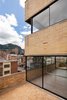 Modern home with Exterior, Glass Siding Material, and Brick Siding Material. Terrace Photo 15 of Tribeca