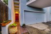 Modern home with Exterior, Shingles Roof Material, House Building Type, Sawtooth RoofLine, and Stucco Siding Material. Entry Way Photo 2 of Harrison Townhomes By Arquitectonica