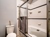 Modern home with Bath Room, Tile Counter, Soaking Tub, Ceramic Tile Floor, Ceramic Tile Wall, and Two Piece Toilet. Bathroom with Soaker Tub Master 266 Harrison St Photo 5 of Harrison Townhomes By Arquitectonica