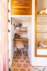 Modern home with Bedroom, Ceramic Tile Floor, and Ceiling Lighting. Built in kids desk area. Our daughter drew the pattern that we decided to incorporate into the tiles for the cement tile floor. Photo 15 of Casa Brumas