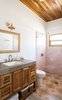 Modern home with Undermount Sink, Ceramic Tile Floor, and Wall Lighting. We chose to hand pour cement on site for the bathroom counters. Photo 18 of Casa Brumas