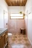 Modern home with Ceramic Tile Floor and Undermount Sink. The pink tiles in this bathroom were chosen to reflect the color of the sky at dusk. Photo 17 of Casa Brumas