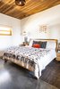 Modern home with Bedroom, Night Stands, Bed, and Concrete Floor. The furniture in the master bedroom was also designed and made locally. Photo 19 of Casa Brumas