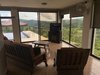 10. Indoor lounge looking out the small pool area Photo 11 of Mountain House GetAway modern home