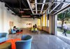 The community and artists’ spaces were designed with individual roll-up doors that allow artists to share their work and wares with the community. Photo 11 of The KLEO Art Residences modern home