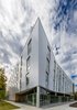 Modern home with Exterior, Apartment Building Type, Metal Siding Material, and Glass Siding Material. KLEO Art Residences, Exterior Photo of The KLEO Art Residences