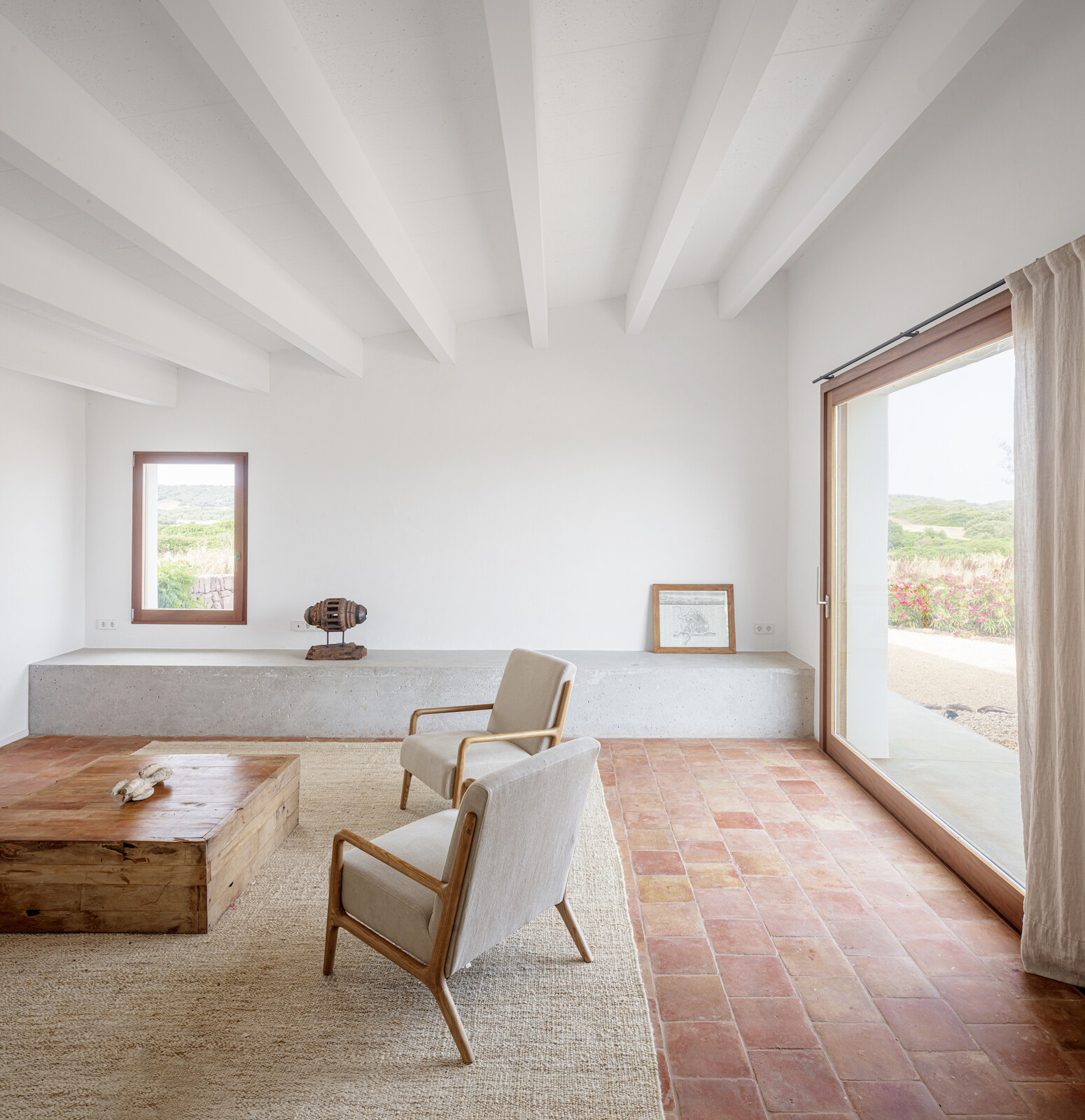 Windows and doors were enlarged to allow a natural transition to the outside.