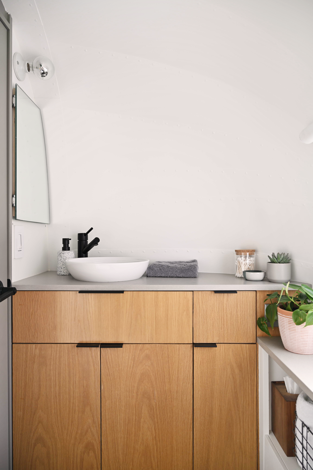 The designers choice a marine toilet for the bathroom, which allowed them to route the plumbing wherever they wanted. 