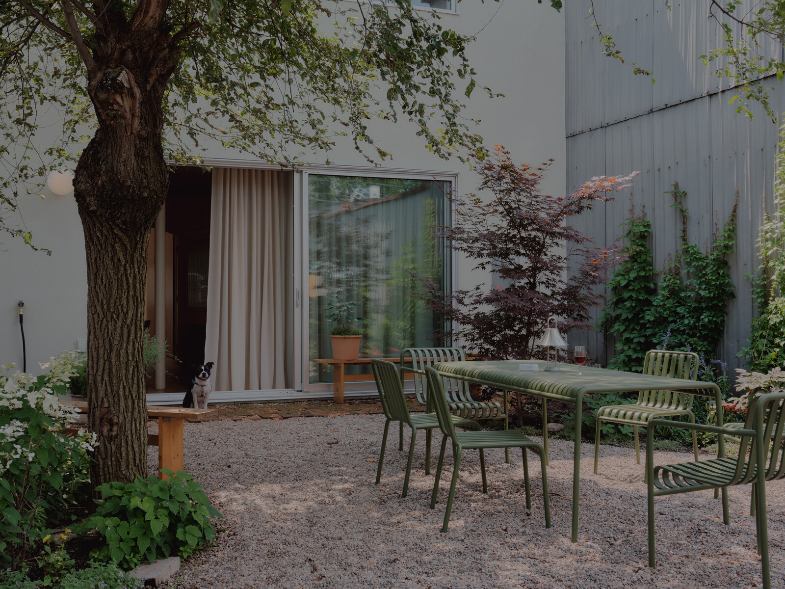 The garden space is as homey as the interior. 