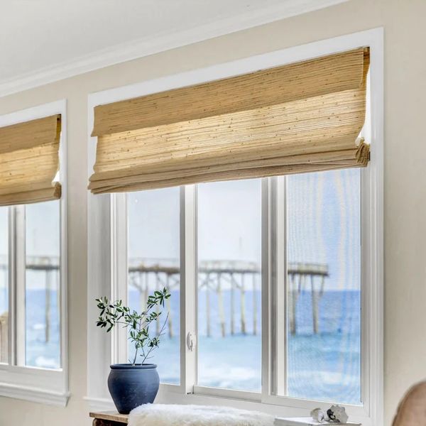 Natural fibers fold into neat pleats for a structured finish that pairs beautifully with neutral palettes.

