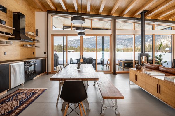 BlueDot pendant lights hang above the kitchen table. 