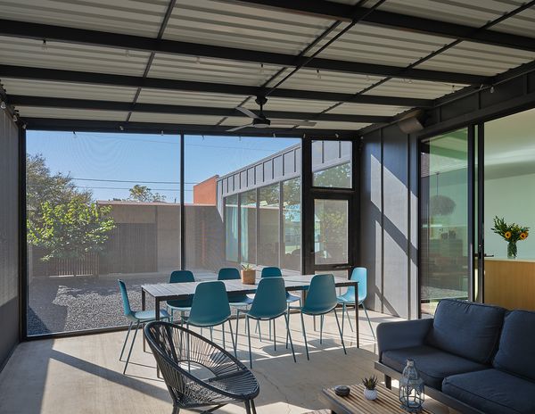 Both sliding glass and screens create an indoor-outdoor environment that maximizes space.