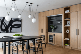 The hidden bar allows the dining room to stay neat and clean during normal use and come alive when entertaining. 