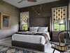 Modern home with Bedroom, Bed, Chair, Lamps, Carpet Floor, and Night Stands. The Master
Textured jute grass cloth walls create a sense of warmth and comfort in the master bedroom. The extra tall upholstered headboard is trimmed in weathered oak. The bed, along with other furniture throughout the home, was custom ordered through KDR Showroom in St. Louis. Accents like an aged wooden mirror frame, ikat embroidered roman shades, and a beautiful patterned rug create the perfect atmosphere for a relaxing night in. Photo 6 of The R Farm House