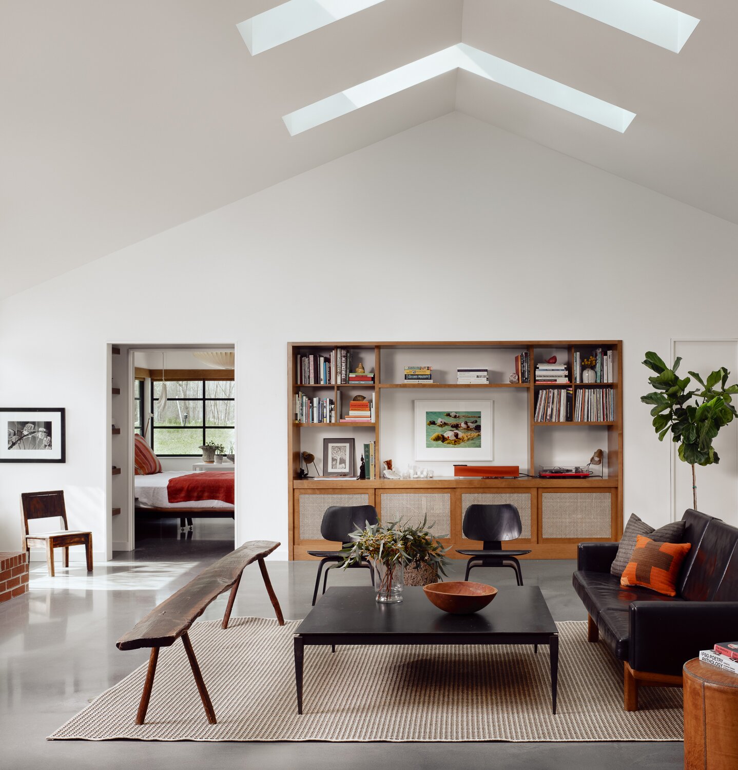 The architects at Side Angle Side added five pairs of skylights during the renovation: two pairs in the kitchen and three in the living room.