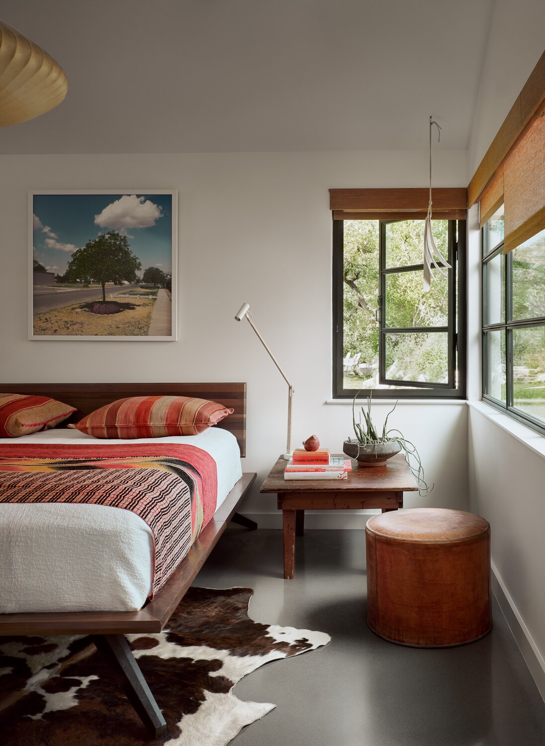 The steel windows were crafted by a local fabricator rather than a brand-name manufacturer to help cut down on costs.