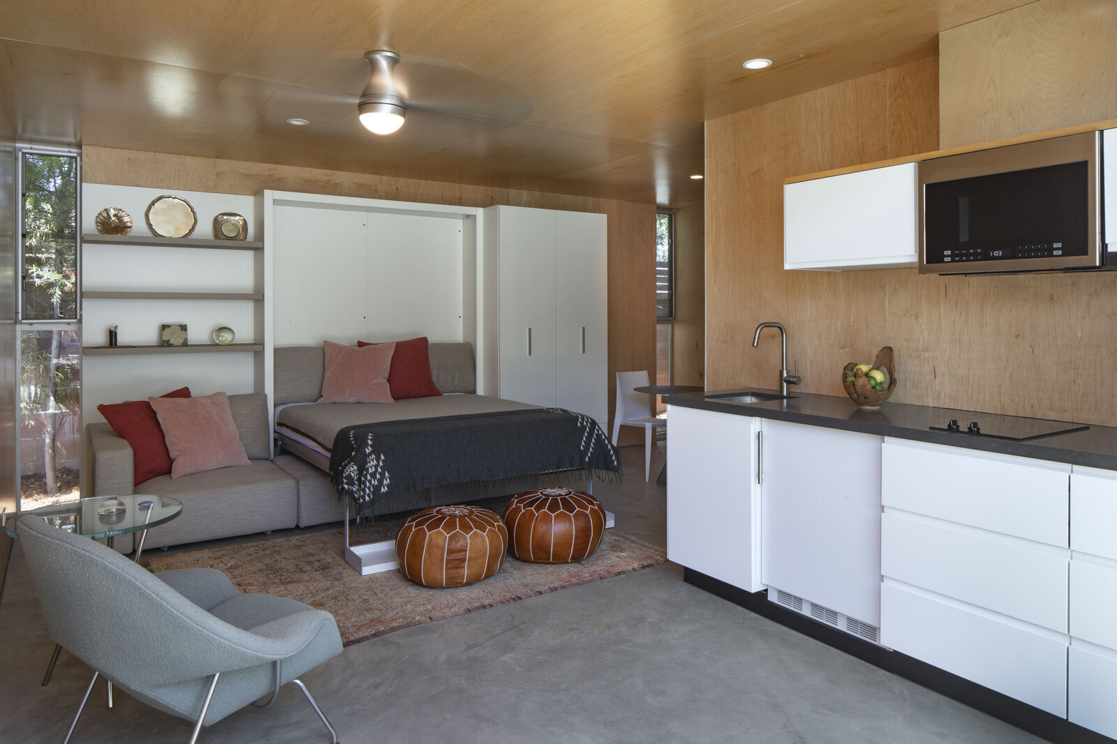 The couple fell in love with a space-saving queen-size Murphy bed that Minarc sourced for them. Made by the Italian brand Clei, it was purchased for $15K from Resource Furniture in West Hollywood.