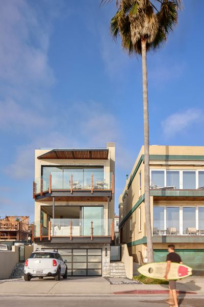 AMMOR Architecture renovated this 1,895-square-foot beach house in La Jolla, California, transforming it into a comfortable, functional family retreat despite it's narrow footprint.