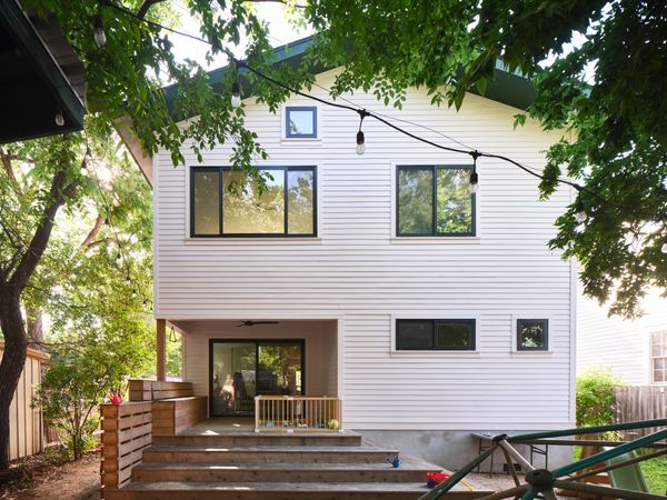 Charles Melanson Architect led a renovation that transforms the roughly 1,000-square-foot home into a two-level, 2,489-square-foot residence without expanding the original footprint.