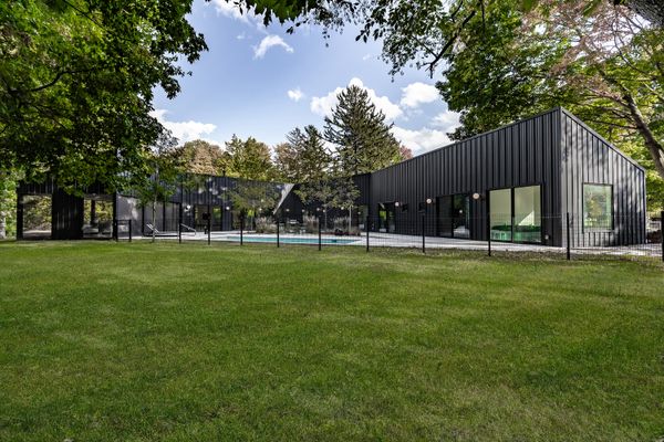 With a triple bunk bed, a pool, and patio seating for 10, this home near Lake Michigan is basically built for long summer days.
