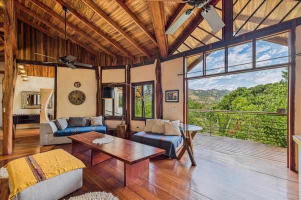 Large patios with landscape views are integrated throughout the residence.