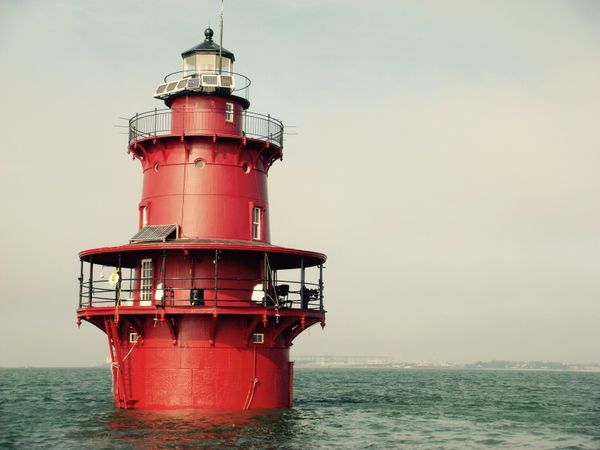 The exterior has been fully restored and repainted in its signature bold red.