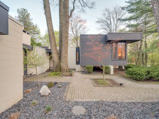 Concrete Blocks Meet Glass Walls at This $635K Michigan Home