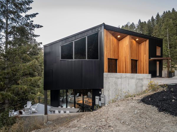 A deck extends from the main living space. A second private deck is connected to the primary bedroom.