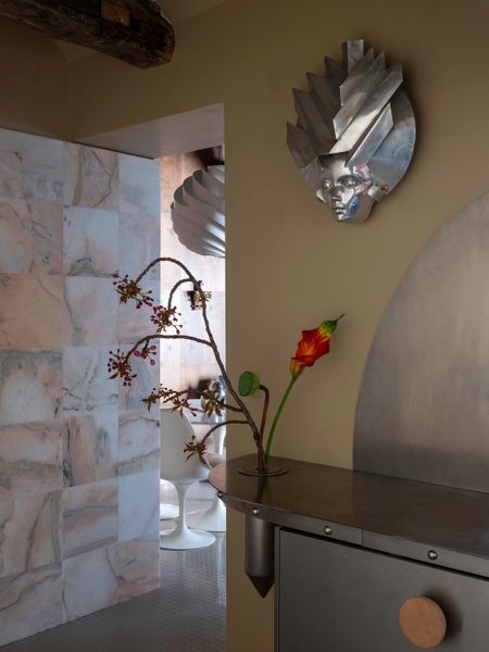 Pink marble tiles were sourced from Portugal.