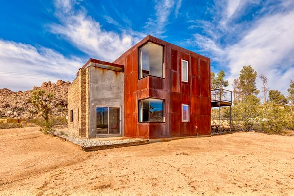 Designed in 2007 by Michael Rotondi, this Cor-Ten steel home brings in big views of the desert landscape—and it’s just a mile from the national park.
