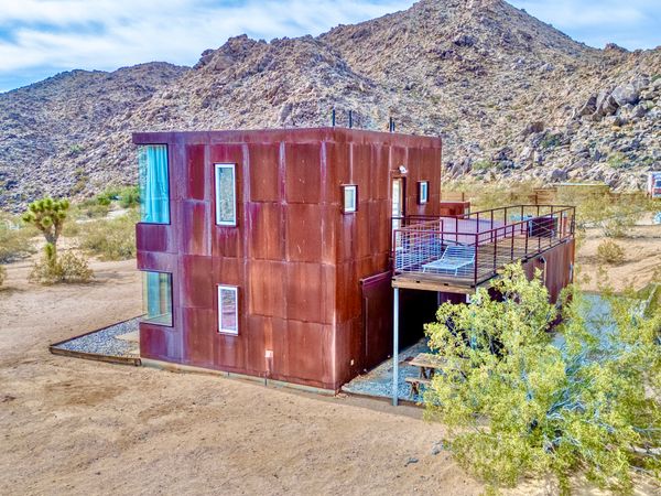 The home faces the Pinto Mountains.