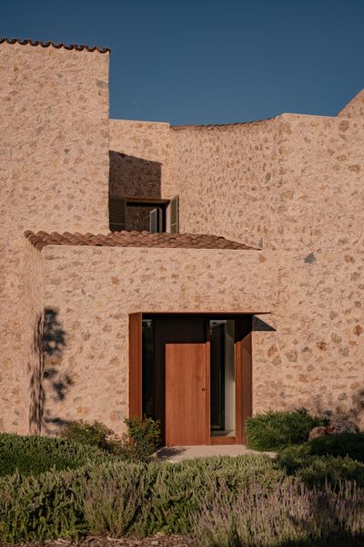 The thick masonry walls use stone sourced from a local quarry.