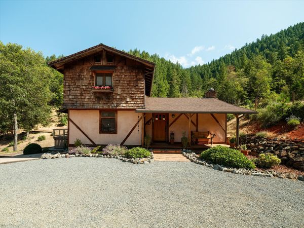 Native Douglas fir, oak, and Jeffrey Pine trees grow throughout the 40-acre property.