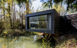Seeking €820K, This Serpentine Home Is Perched Above a Pond in Southern France