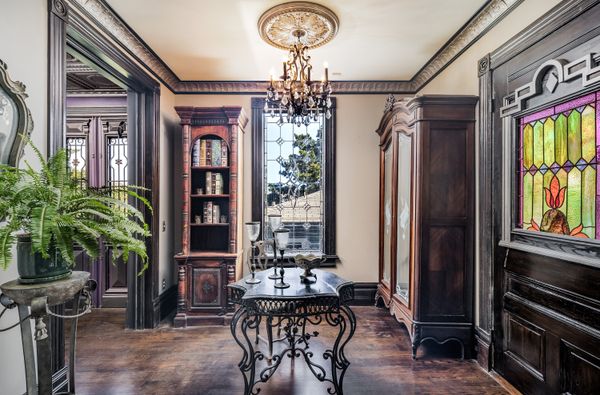 The home is illuminated by more than 30 chandeliers and custom sconces.