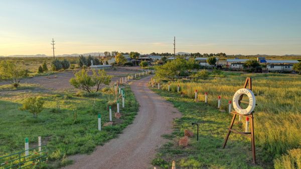 Formerly operating as Marfa Yacht Club, the property is an RV Park overlooking the Chinati and Davis mountains, and working ranch lands.