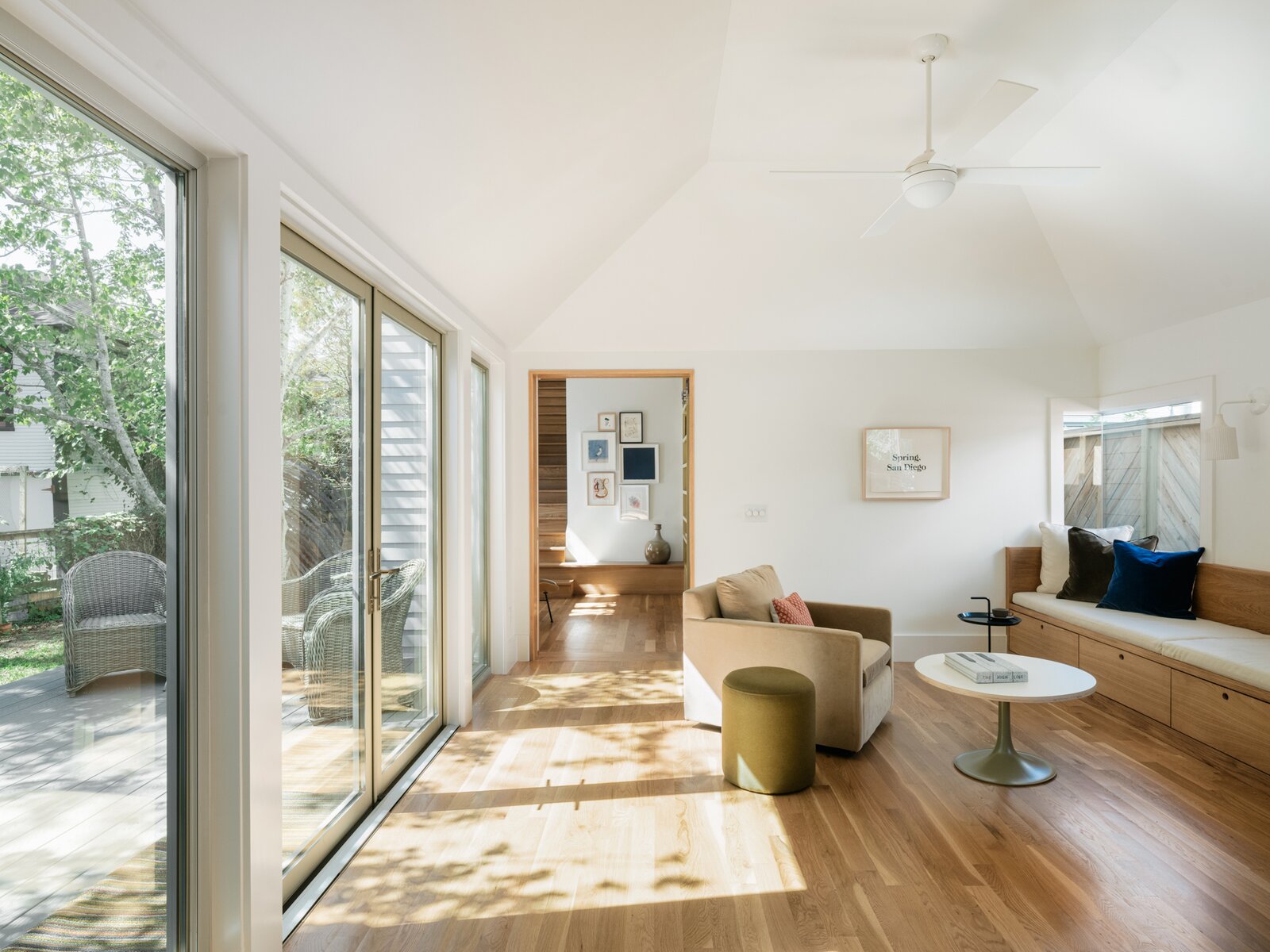 In the family room, which connects the addition with the original house, Janusz opted for a vaulted ceiling. "To transition from the single-story space, we used a change in volume relative to the new flat ceilings.