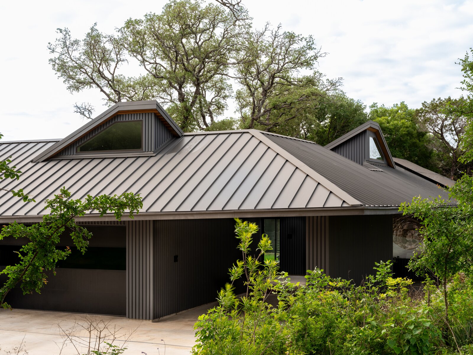 The roof is bonderized steel, which gives it a matte gray color, and the siding is Kebony—a thermally modified wood.