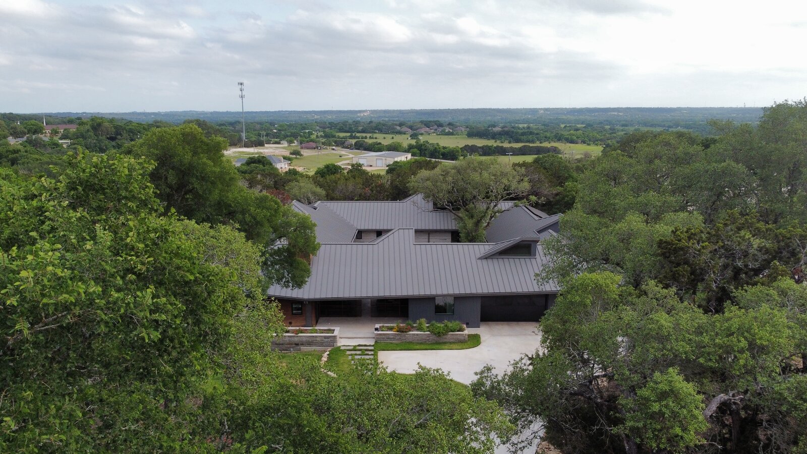 Part of what drew the homeowners to this property was the lush environment, and it was important to them to disturb as little of the land and cut down as few trees as possible. 