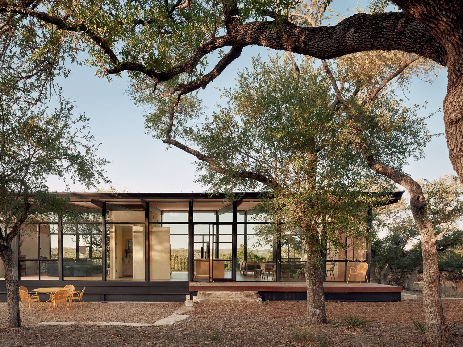 Constructed primarily of dark steel and glass, the simple, rectangular form blends seamlessly with its surroundings. 