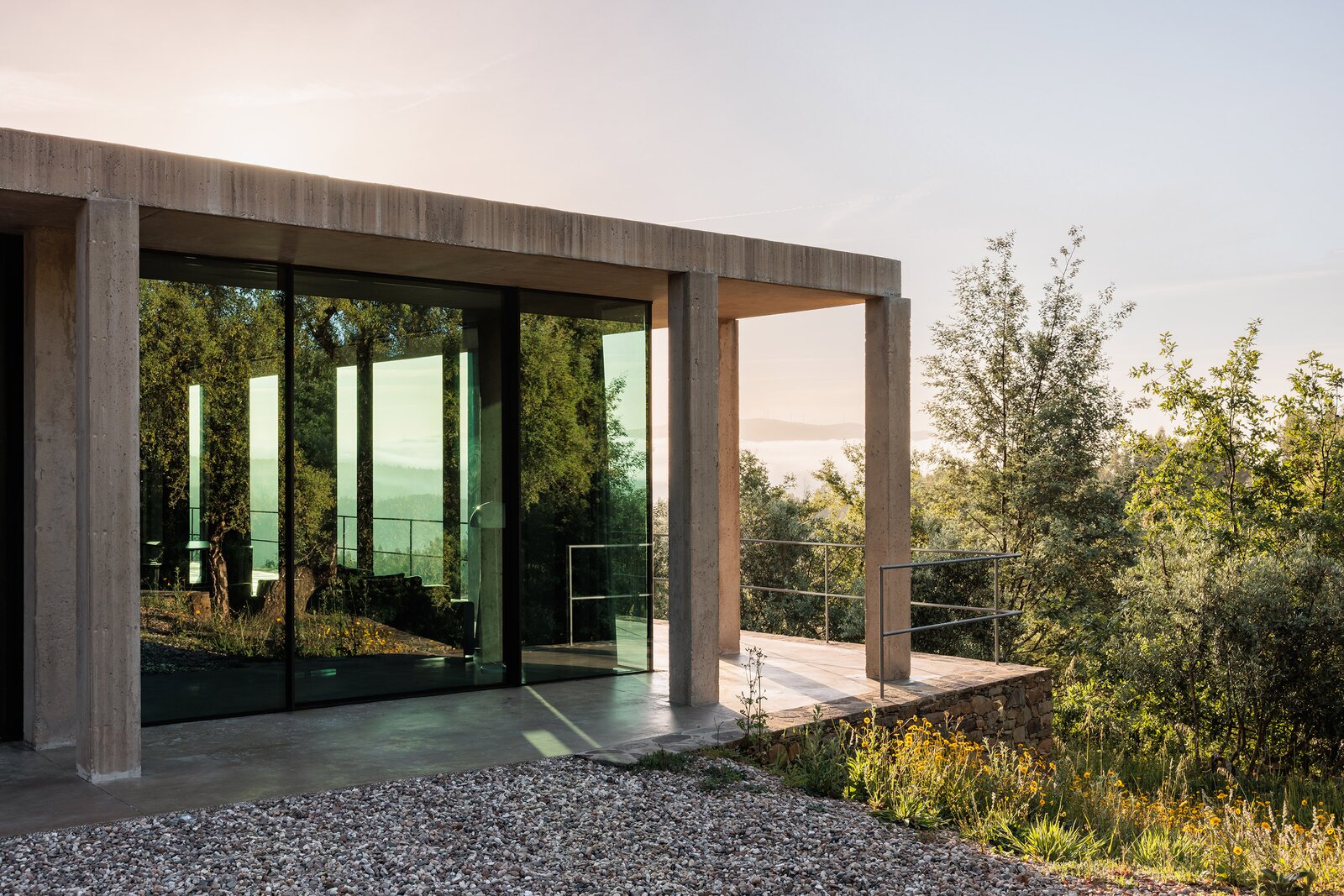 The existing stone-walled terraces were an inspiration to the architecture of the house. Architect Miguel Marcelino told the homeowners that the columns were like stakes for the vineyards that could have once been here.