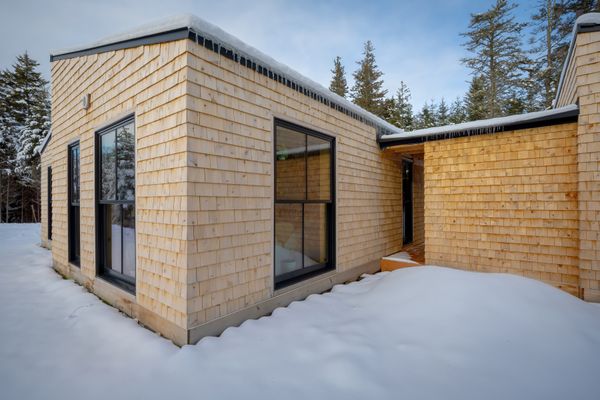 To create a high-performance home with healthy materials, the team used an Adhero self-sealing house wrap, a Stego vapor barrier, Havelock Wool insulation, and an Intello interior air barrier.
