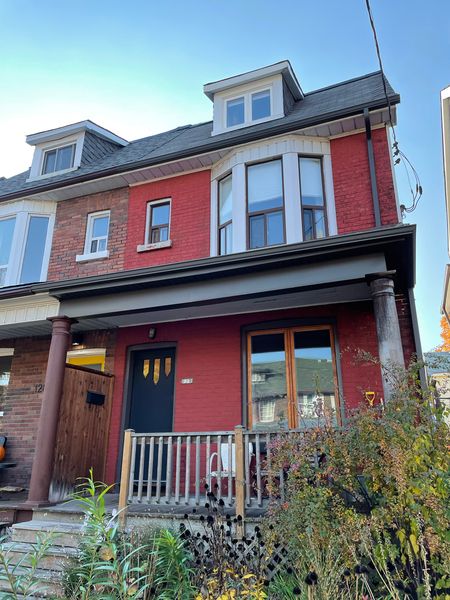 Before: The early 1900s home's underutilized front porch sported a pair of Tuscan columns.