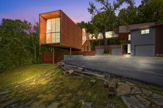 A Bridge Connects the Wings of This Wild $1.3M Home in Nebraska